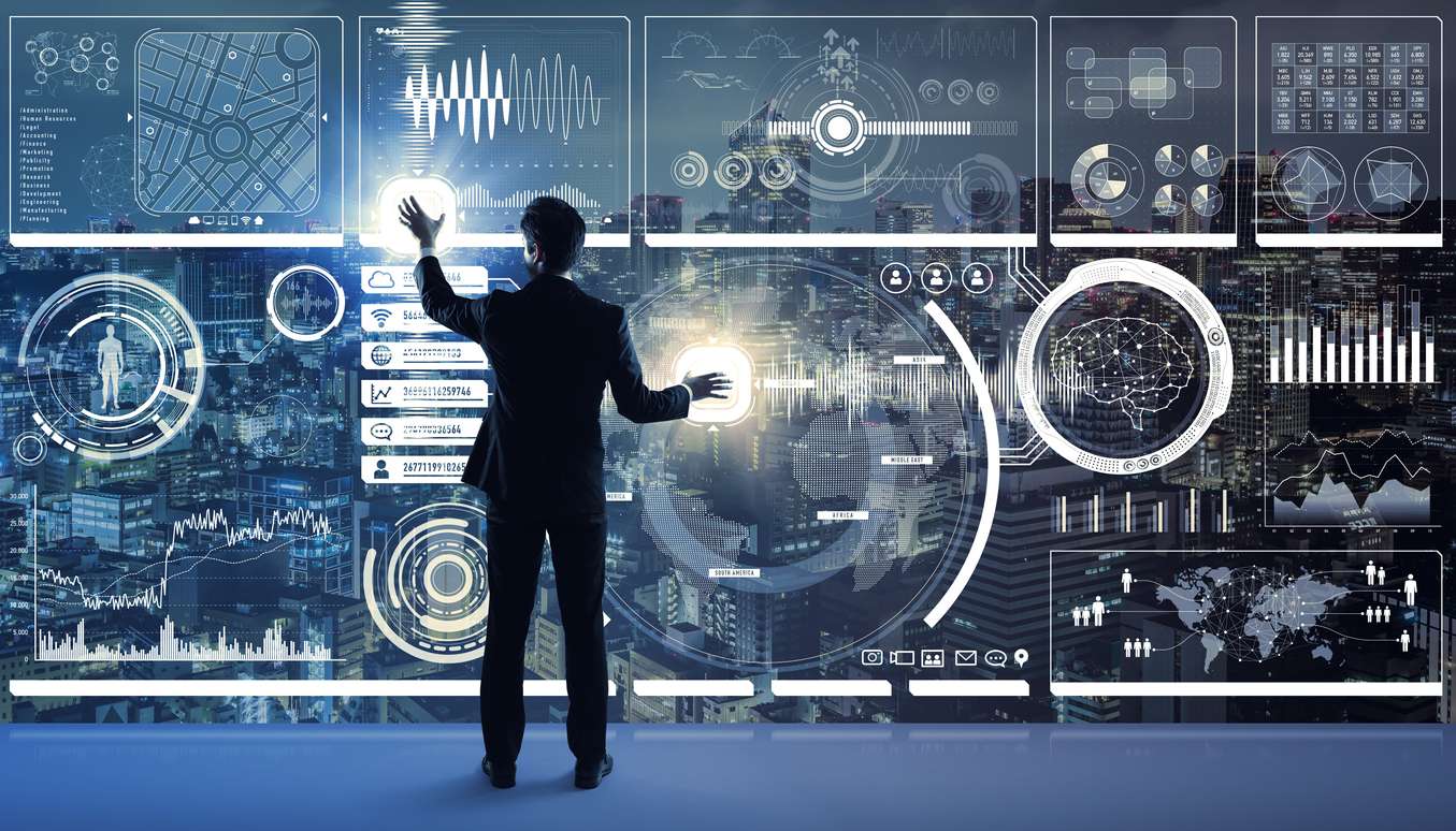 Man touching large cloud ops screen